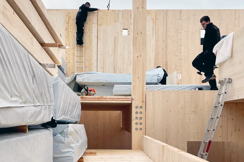 Een huis bouwen met kruislaaghout (CLT): waarom kiezen voor massief hout?